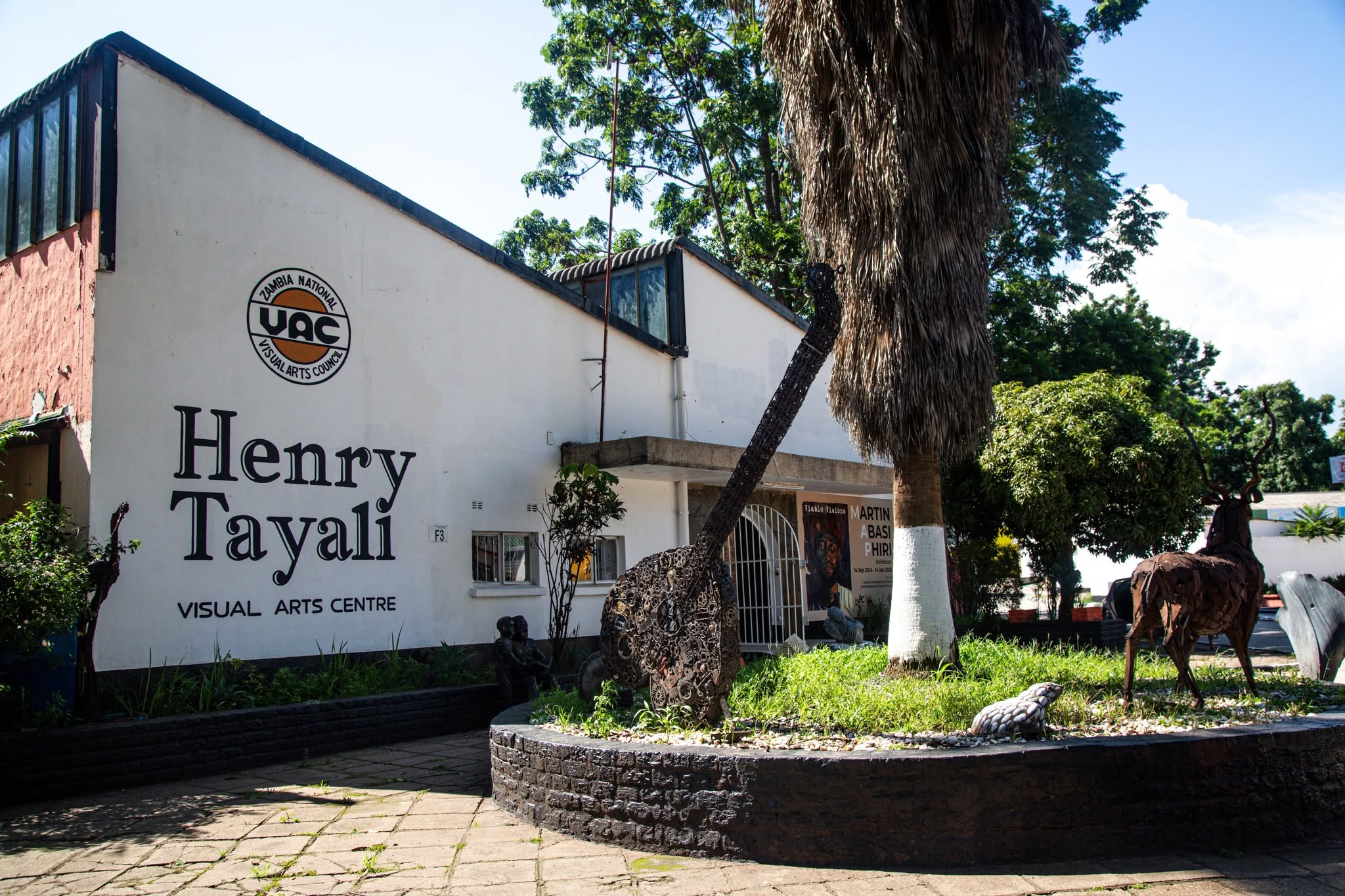 The Henry Tayali Gallery is the closest thing Zambia has to a national gallery. It sits on Lion Lane in the Lusaka Showgrounds, in a building converted from an old tobacco warehouse, and is run by the Zambia National Visual Arts Council under the motto "By the artists, for the artists."